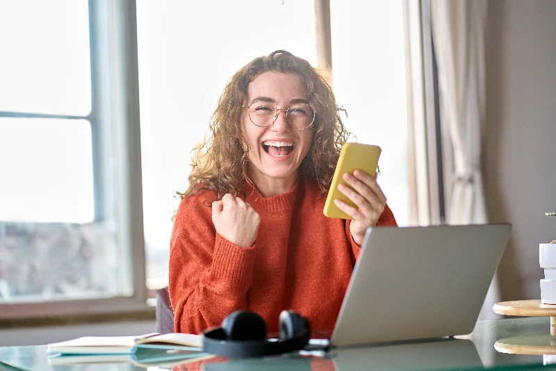 young happy lucky woman feeling excited